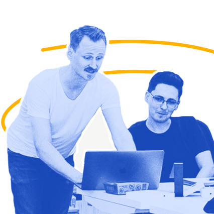 A photo of a Thinkmill team member collaborating with a client.